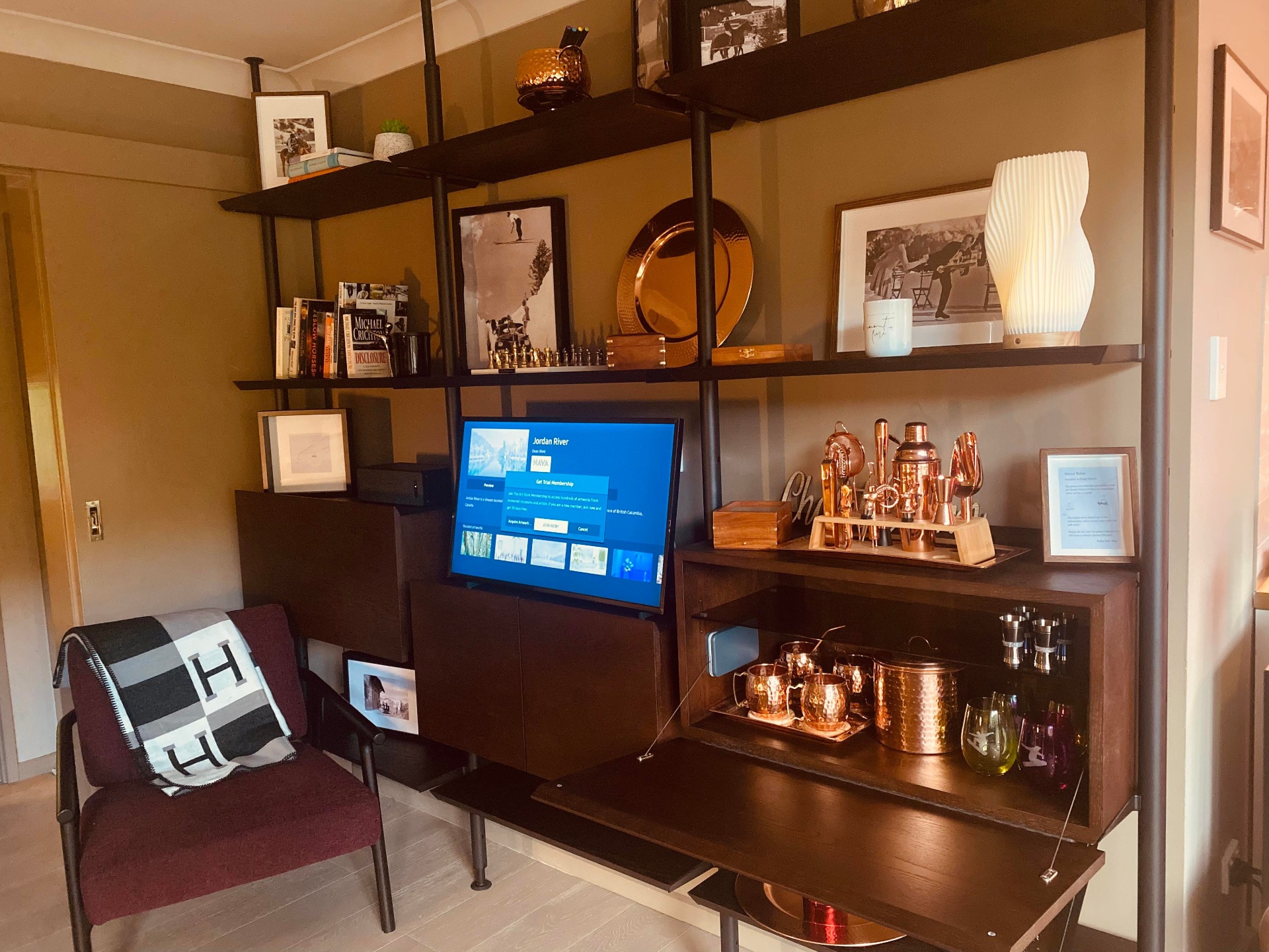 Smart TV, SONOS sound system and styled copper cocktail cabinet at Chalet Charm Thredbo apartment